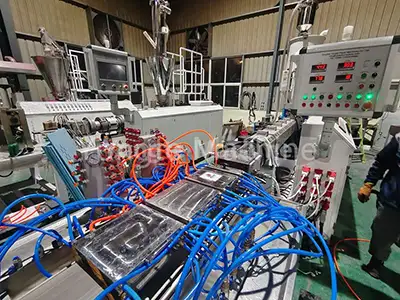 Recycled plastic lumber machine